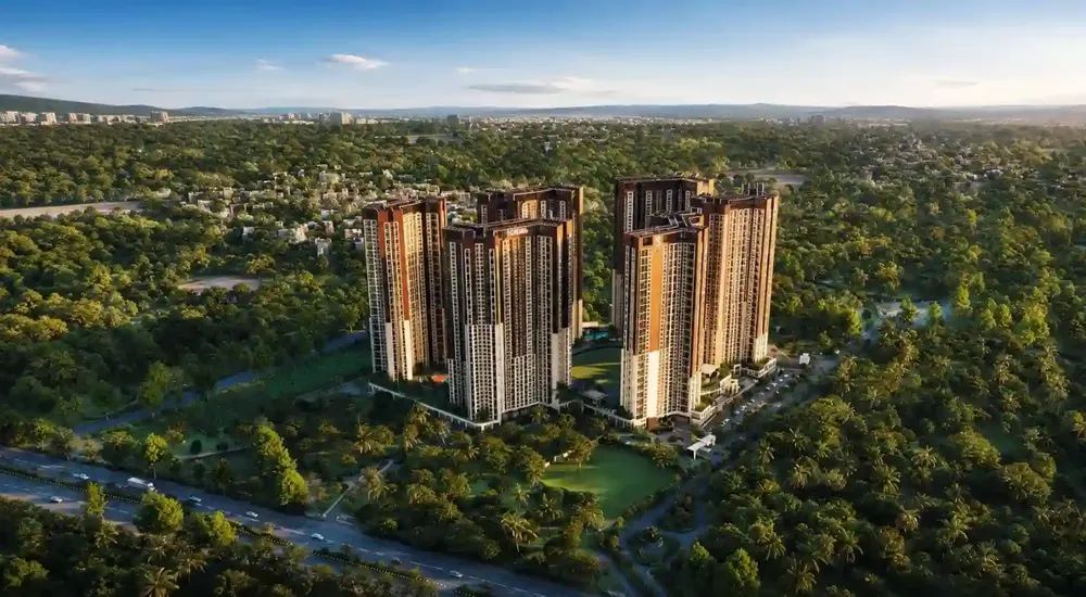 Aerial view of the Embassy Origins township set in green landscape