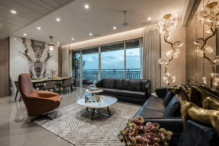 Representative living room with city-facing balcony